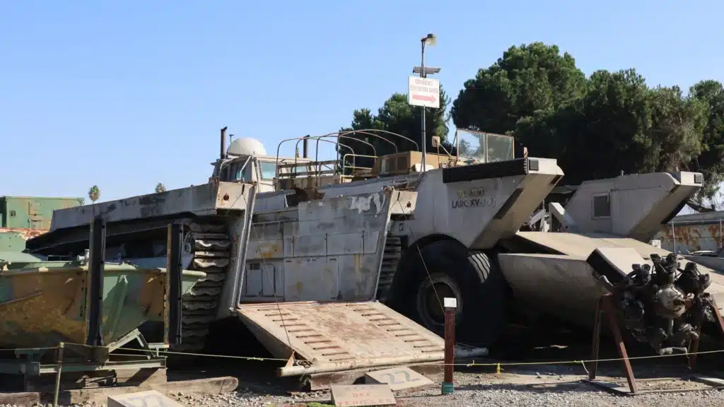 Concrete flood control channel structure with maintenance ramp and equipment in El Monte, California.