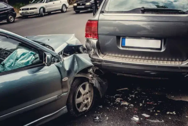 Rear End Accident Lawyer Reviewing Collision Evidence With an Injured Client During a Legal Consultation